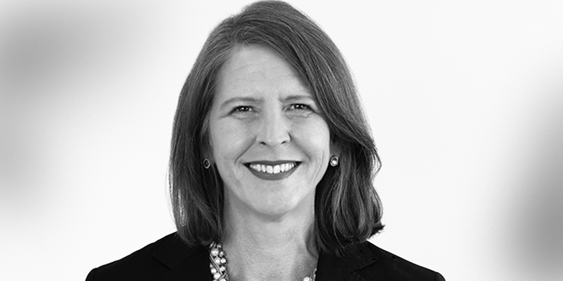 Black and white headshot of partner Lori Mince