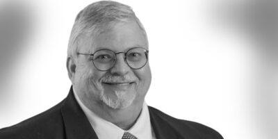 Attorney Noel Darce black and white headshot