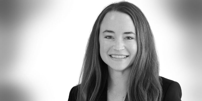 Black and white headshot of attorney Madeline Flores
