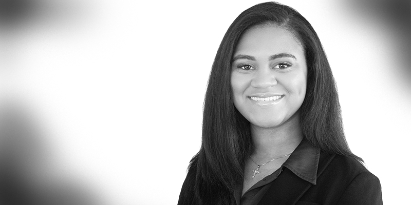 Black and white headshot of Maya Jones